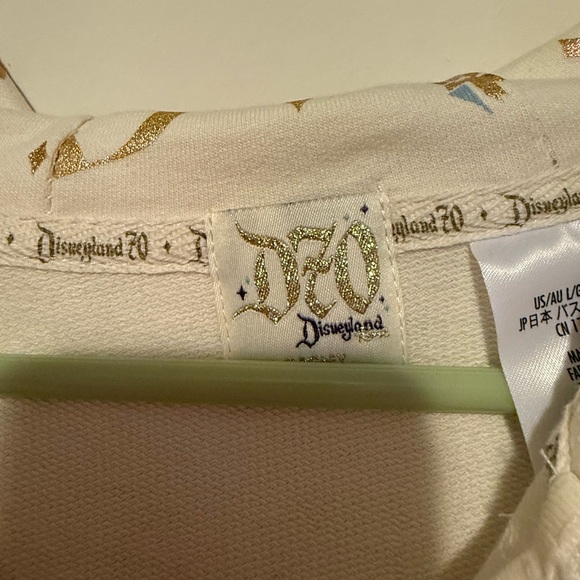 Disneyland 70th Cream Zip up with Gold Accents - Picture 2 of 4